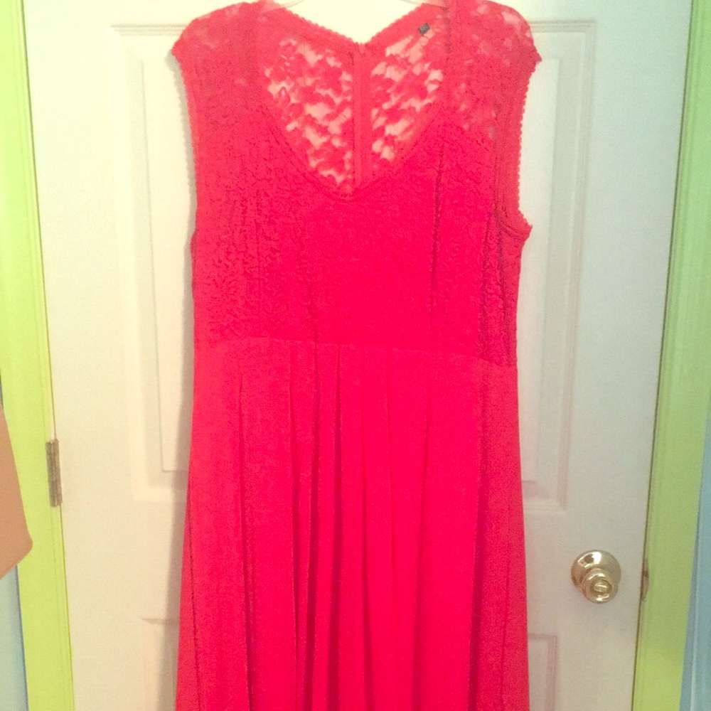 Beautiful red short sleeve bridesmaid’s dress.